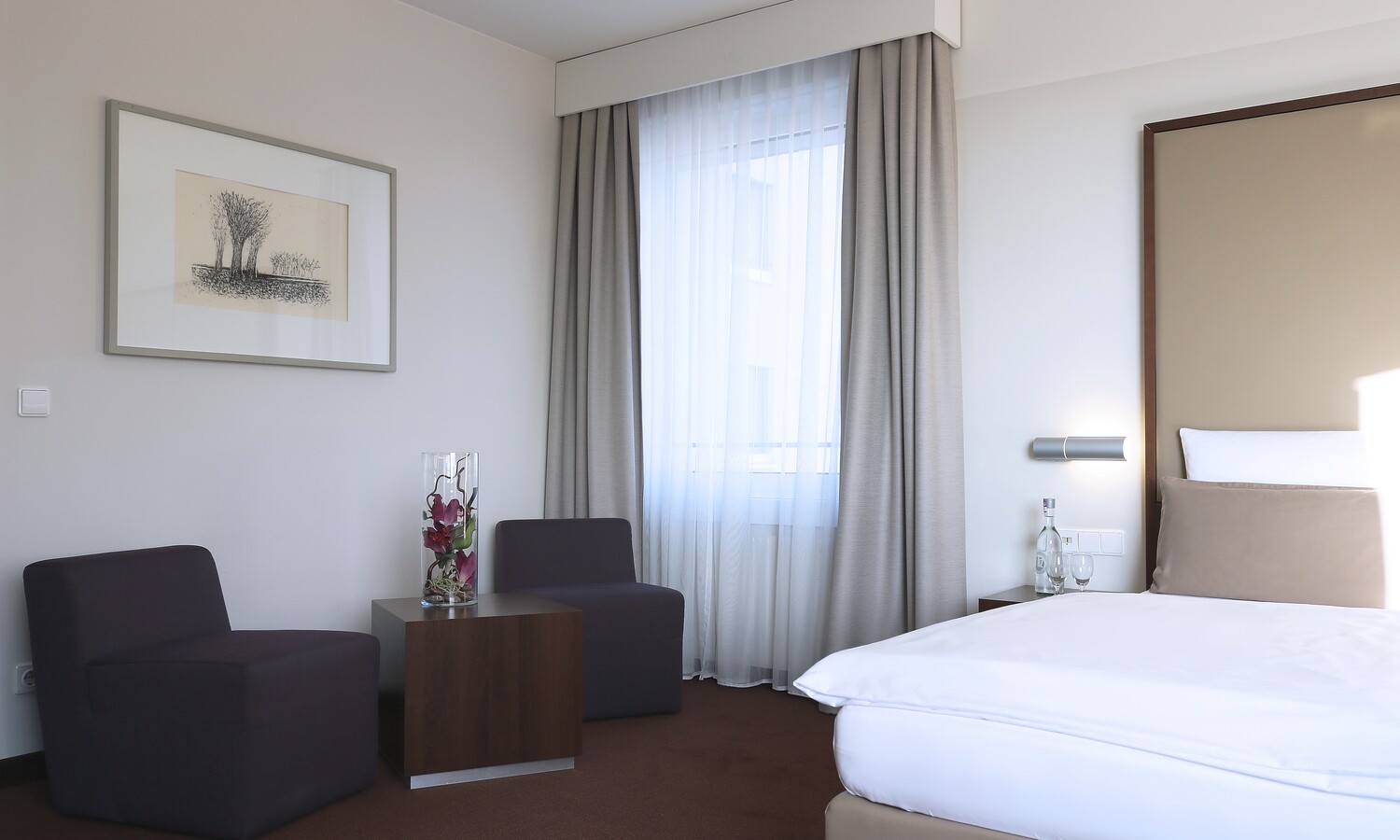 Deluxe room with double bed at the Estrel Berlin