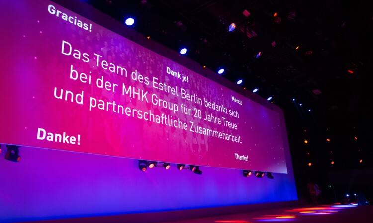 Stage and screen with word of thanks for partnership