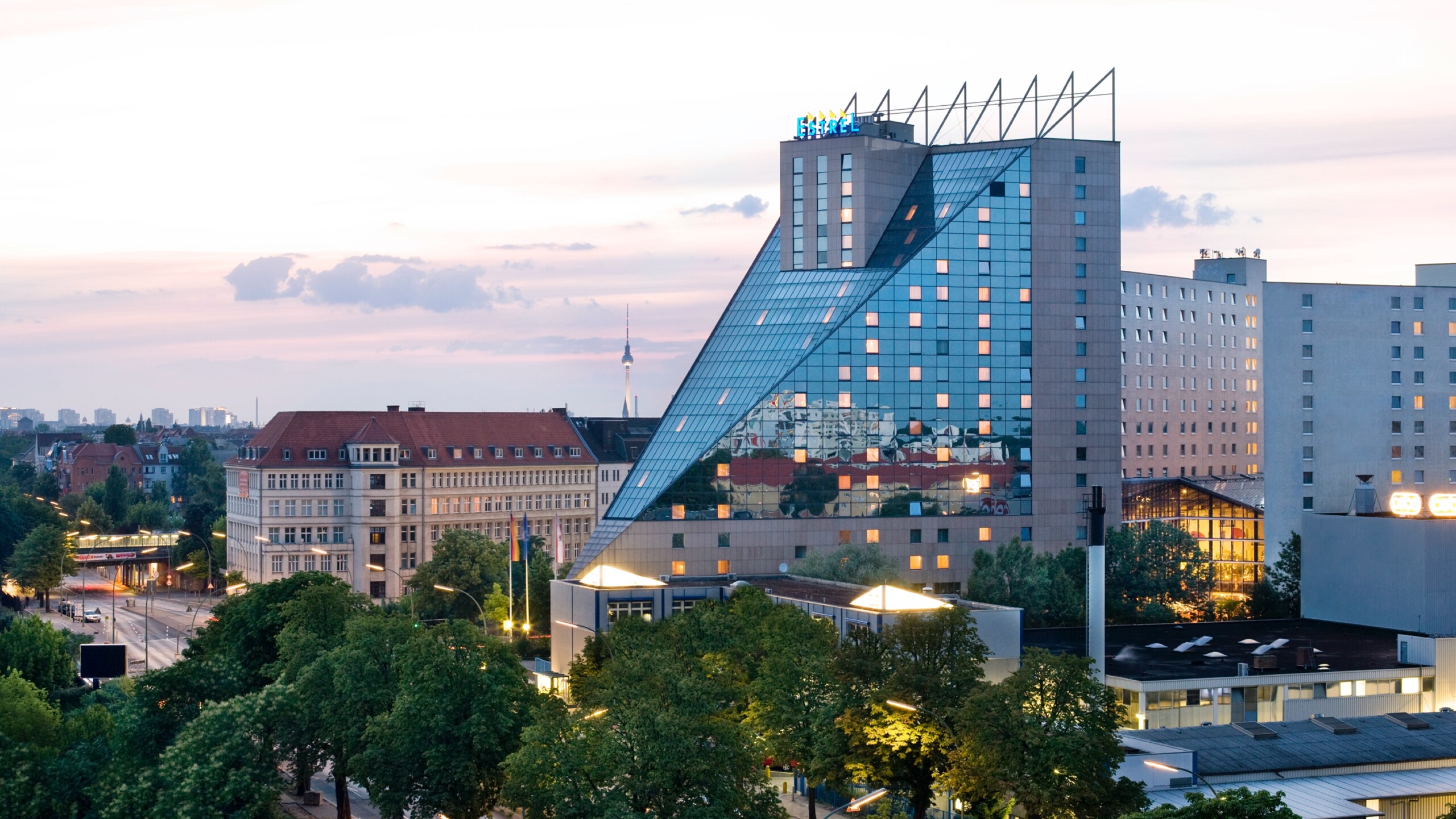 Exterior view of the Estrel Hotel Berlin during sunset