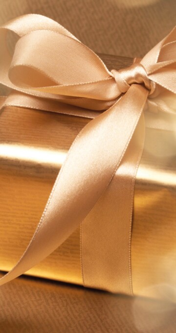 Estrel Gutscheinshop Goldenes Geschenk